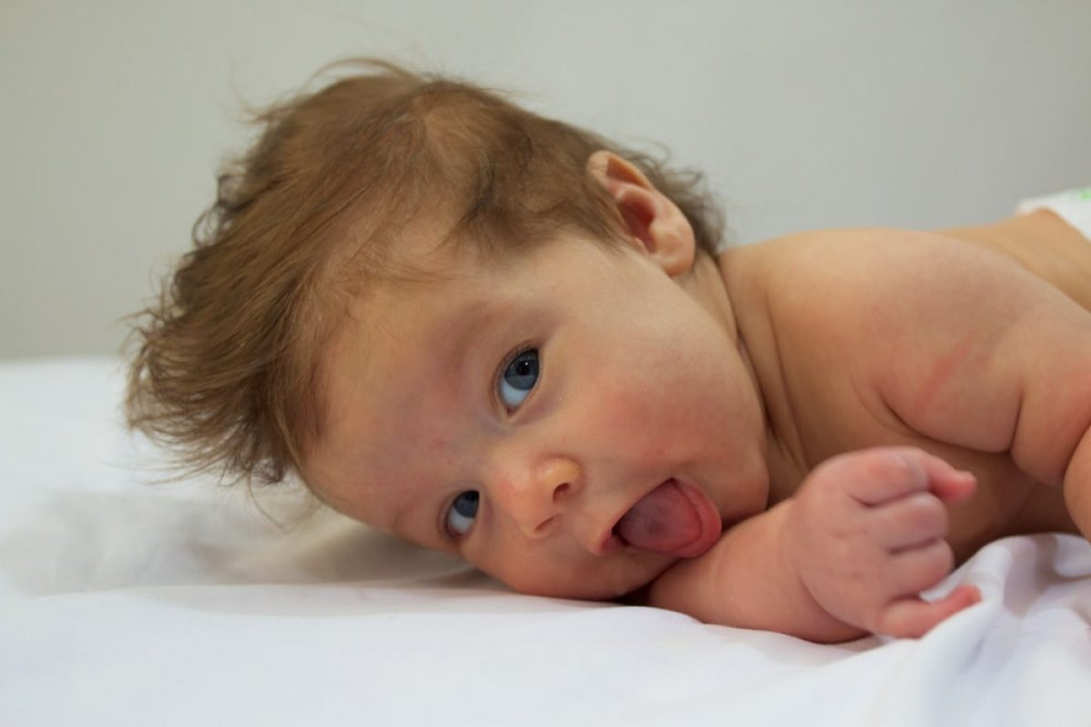 Is Your Baby Sticking Their Tongue Out A Lot? What Does It