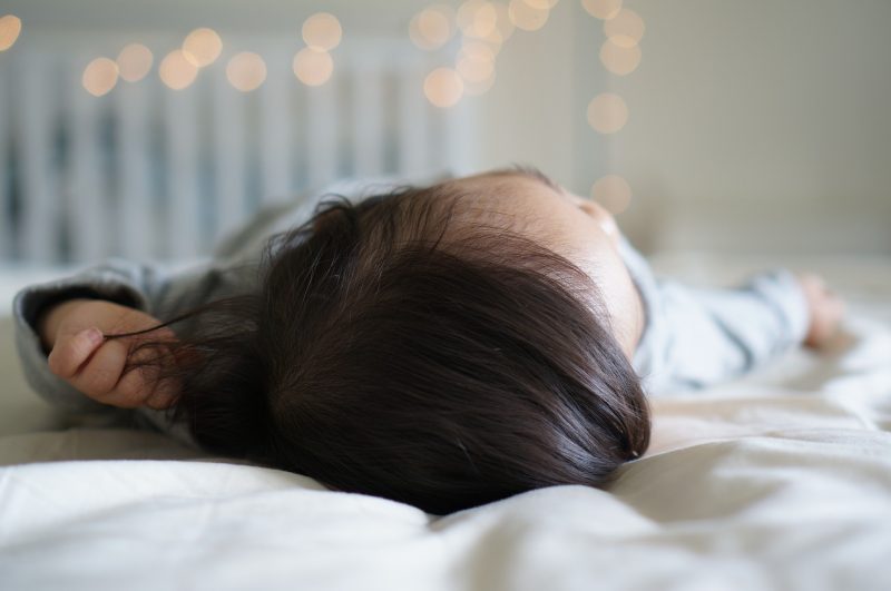 how-to-prevent-baby-from-hitting-head-on-crib-while-sleeping