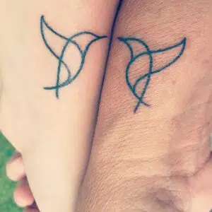 matching bird tattoos