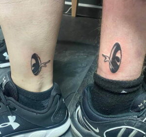 matching alien tattoos
